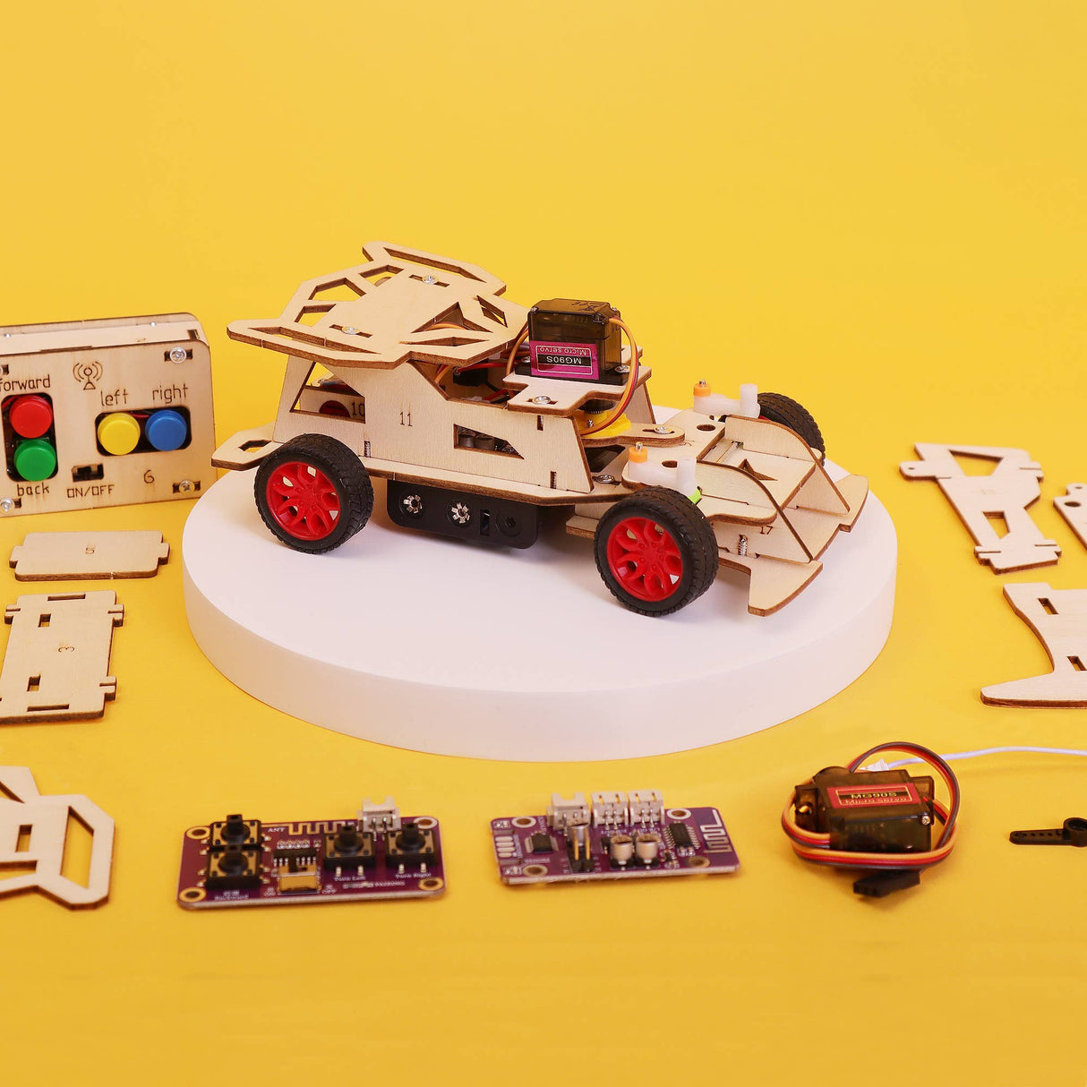 Wooden robot model with electronic components on a yellow background