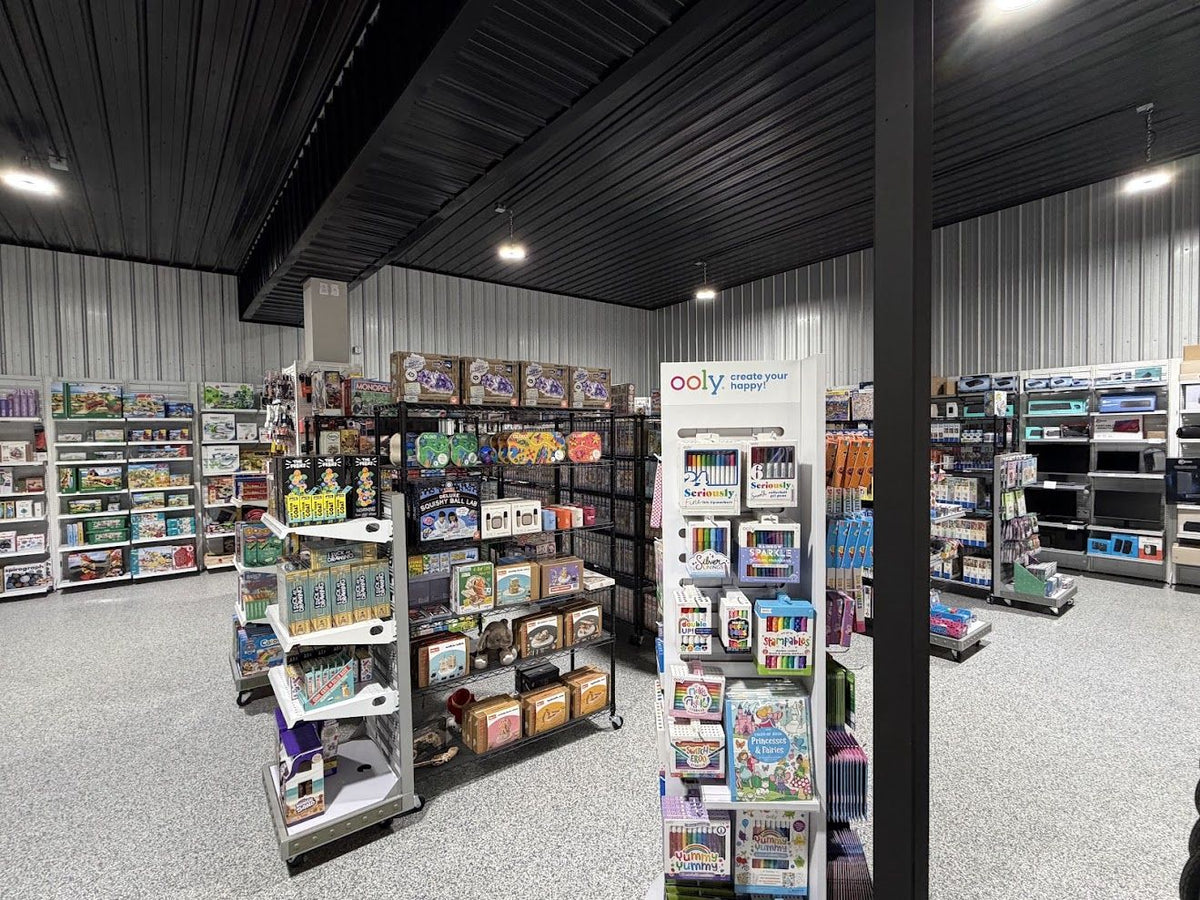 Inside Cole's Computers at 418 S Main Ave in Platte, SD: aisles of games, toys and puzzles