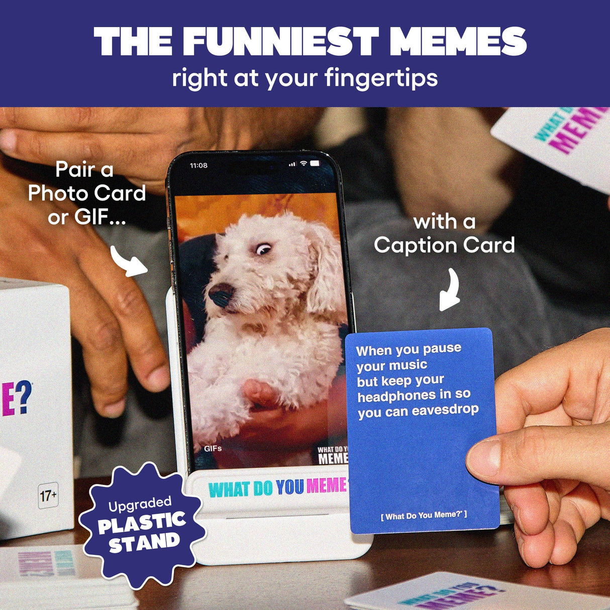 Person using a smartphone with a meme app, holding a caption card, and interacting with photo cards.