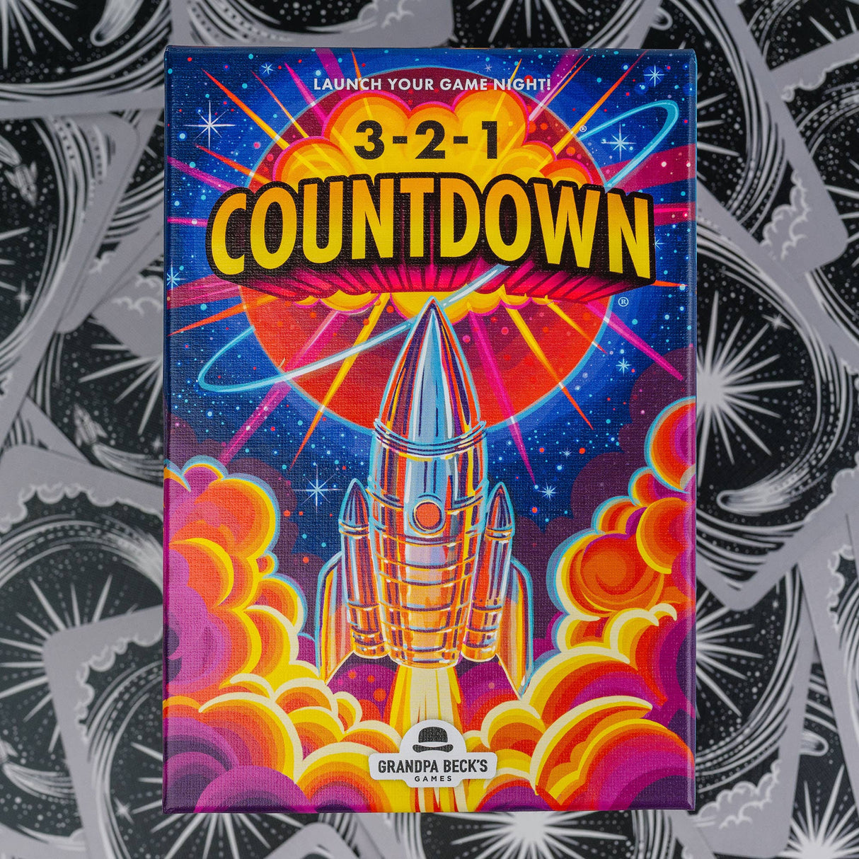 Colorful packaging of '3-2-1 Countdown' game with a rocket and space theme.