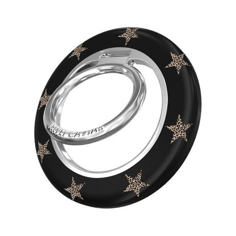A black ring holder with a silver metal core and gold star accents, featuring the brand name 'VELVET CAVIAR' engraved on the silver band, set against a plain white background.
