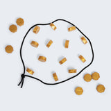 Necklace with gold geometric pendants on a white background