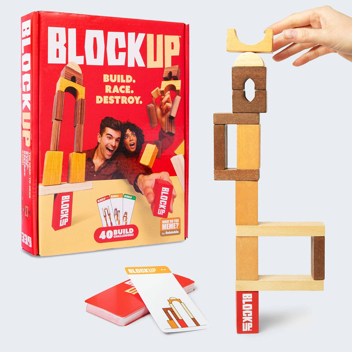 Blockup game set with wooden blocks and cards on a white background