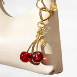VELVET CAVIAR - Tech & Bag Charm- Cherry