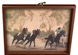 Decorative box with a painting of three horses racing, framed in wood.