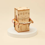 Wooden robot model on a white pedestal with a beige background