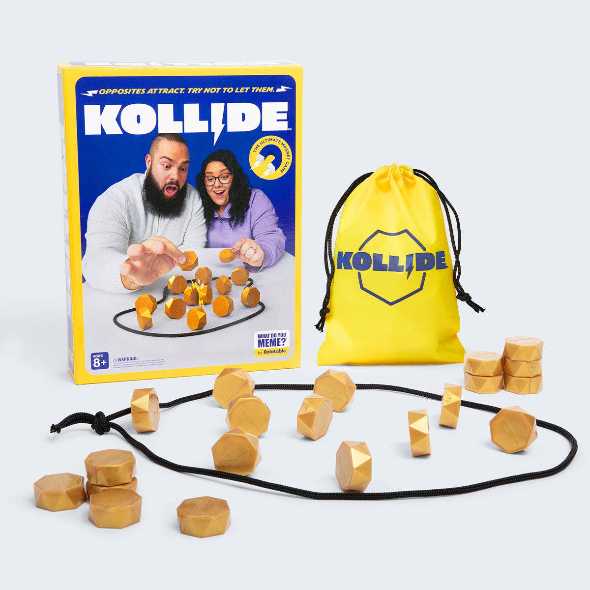 Kollide game set with packaging, wooden pieces, and drawstring bag on a white background