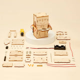 Wooden robot kit with components on a beige background