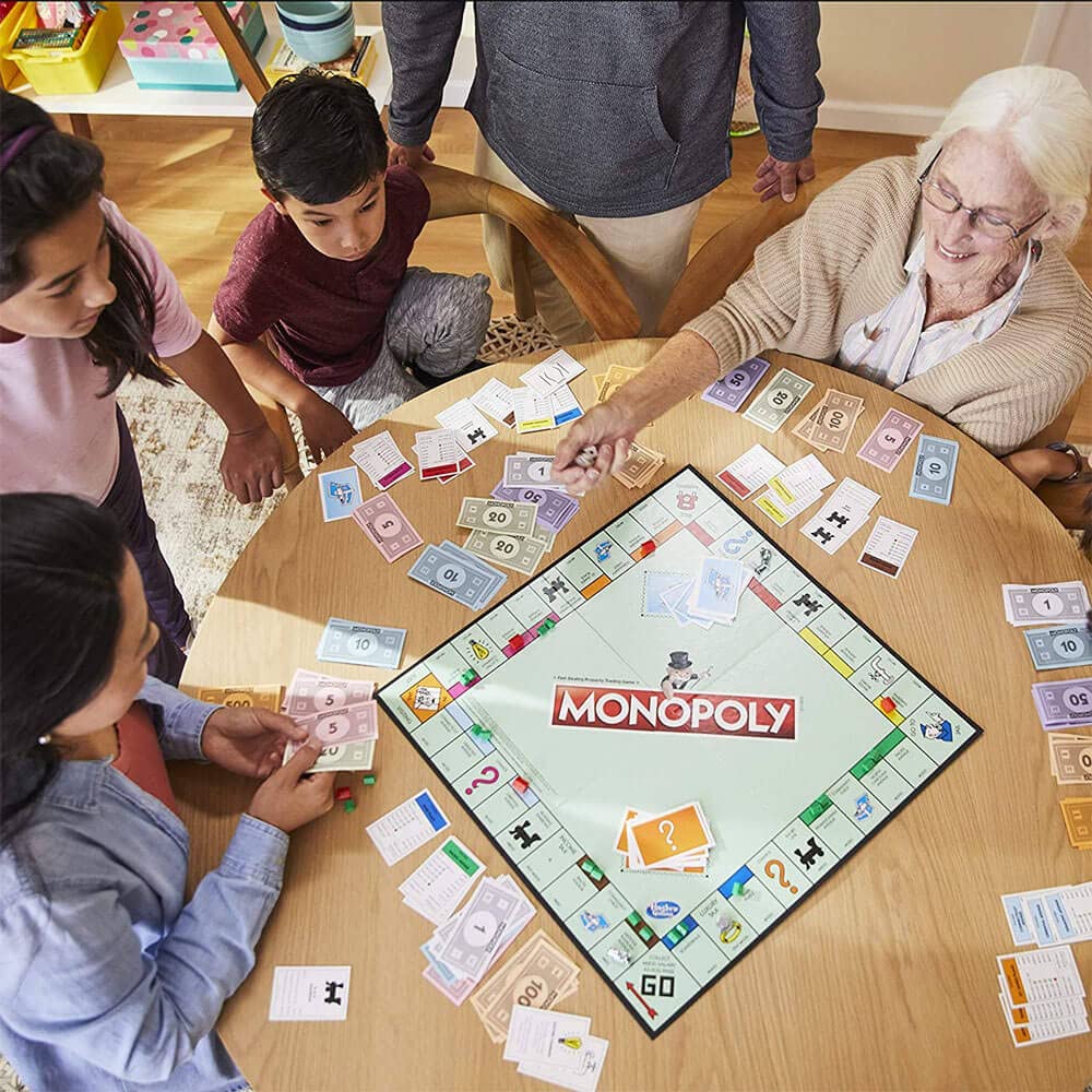 Monopoly Game, Family Board Game for 2 to 6 Players, Monopoly Board Game for Kids Ages 8 and Up, Includes Fan Vote Community Chest Cards