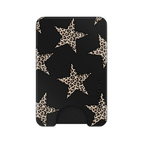 A slim black card holder wallet featuring a pattern of large beige and brown leopard-print stars, with a small black grip at the bottom and the brand name 'VELVET CAVIAR' printed vertically on the right side.