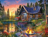 Springbok Sun Kissed Cabin 500 Piece Jigsaw Puzzle for Adults Features a Fishing Cabin by The Lake in a Colorful Illustration