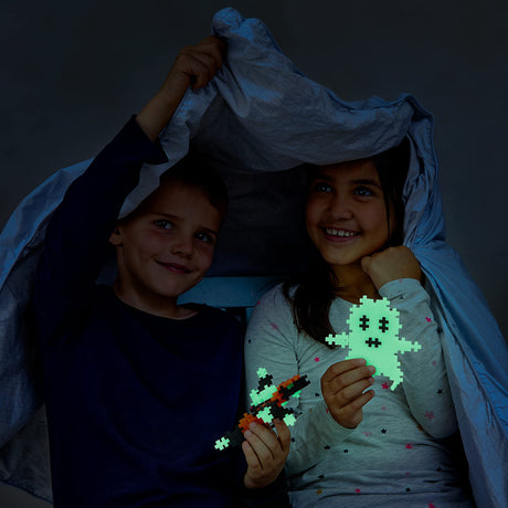 PLUS PLUS 70 Piece Interlocking Building Blocks for Kids - Glow in The Dark Play Tube