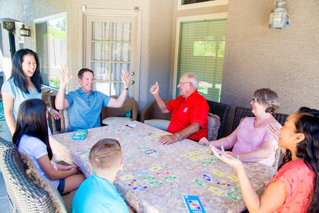Family game night playing SKYJO