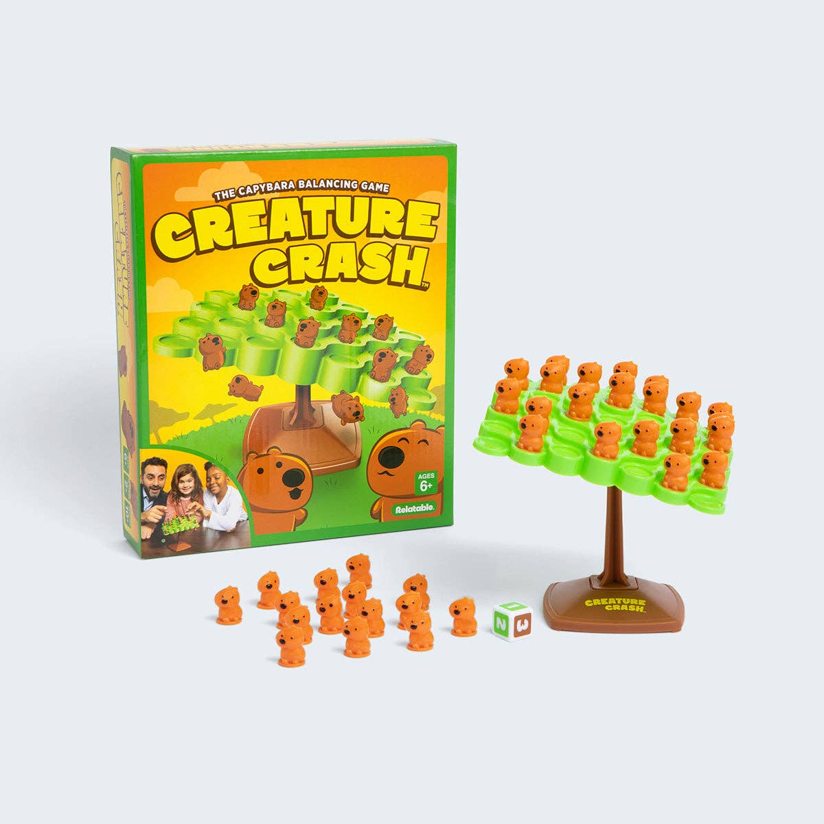 Creature Crash game set with packaging and game pieces on a white background
