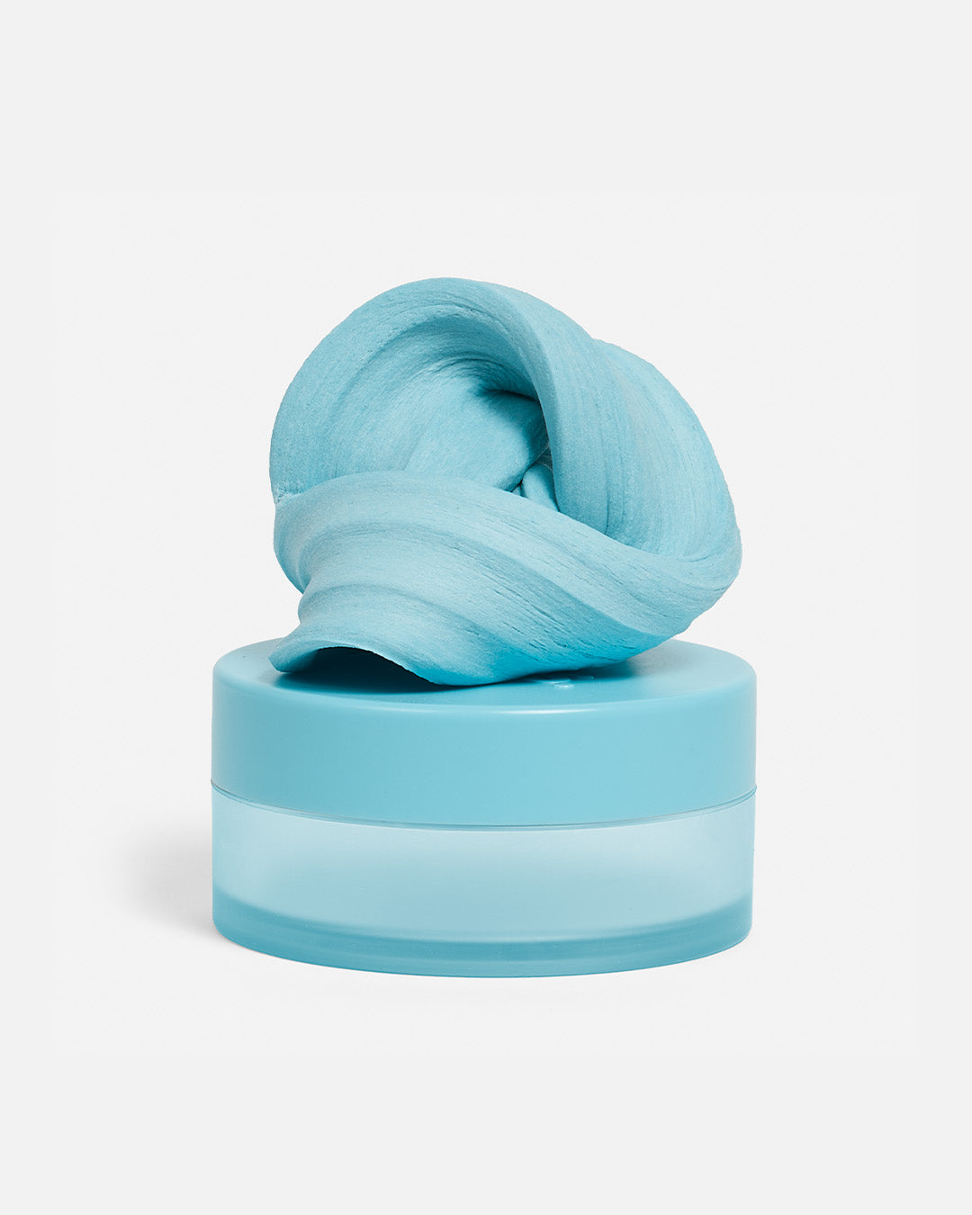 Speks Blur calming focus putty in light blue on its container