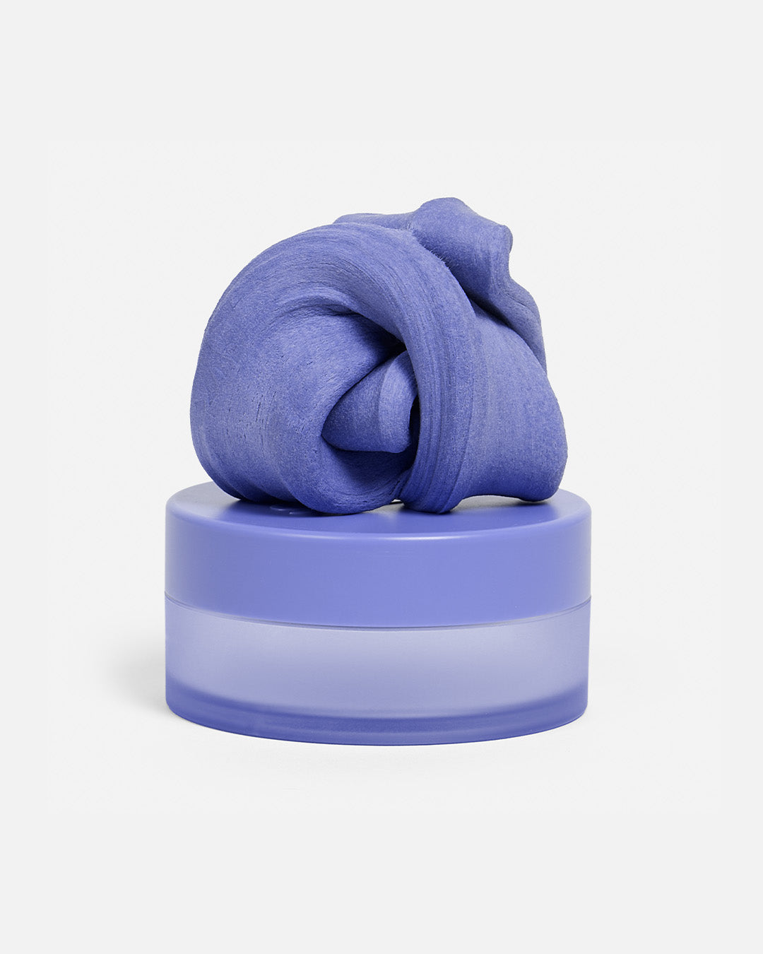 Speks Blur calming focus putty in purple on its container