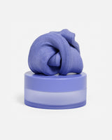 Speks Blur calming focus putty in purple on its container