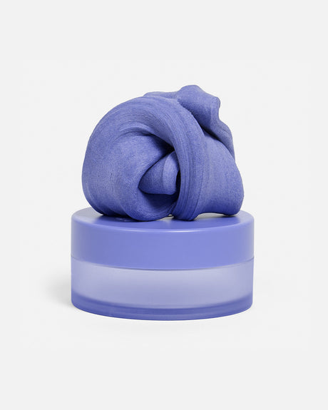 Speks Blur calming focus putty in purple on its container