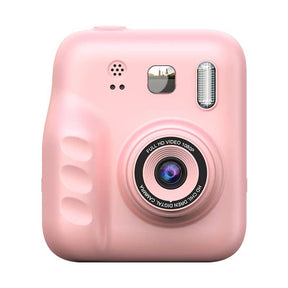 Pink instant camera on a white background