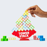 Colorful tower stack game with a hand placing a block on top, on a white background.