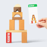 Wooden blocks stacked in a tower with a hand holding a card labeled 'BLOCKUP' against a white background.