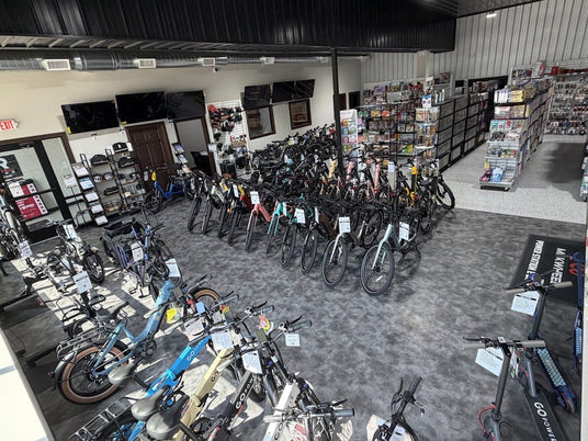 Cole's eBikes showroom at 418 S Main Ave in Platte, SD, with rows of electric bikes