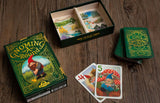 Gnoming a Round card game on a wooden surface with cards and box visible