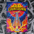 Colorful packaging of '3-2-1 Countdown' game with a rocket and space theme.