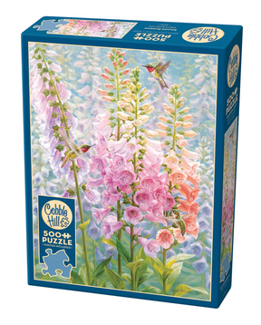 Cobble Hill puzzle box with floral design and hummingbird on a white background